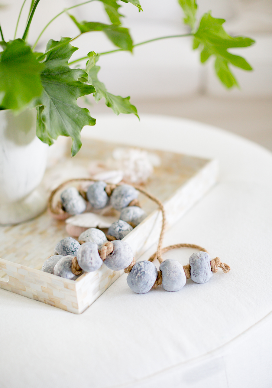 This thread of cement balls is a simple accessory that is making a new trend in farmhouse style decorating