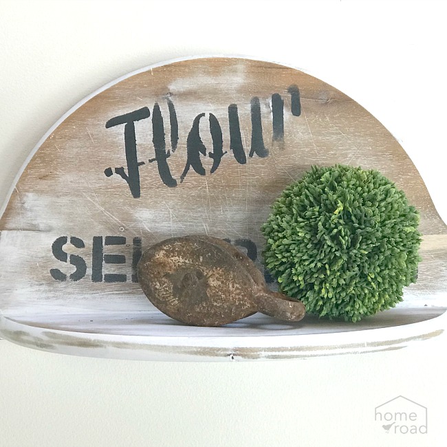 This cutting board got a new life as a decorative shelf after this fixer upper makeover