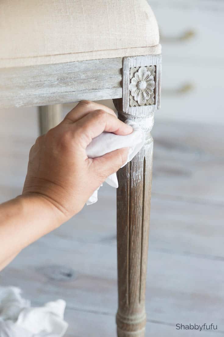 This farmhouse diy takes a vintage chair and adds a weathered paint touch