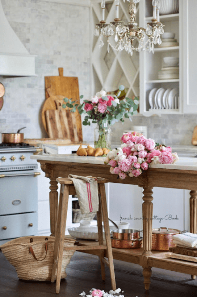 This farmhouse style kitchen has vintage elements as well as modern touches