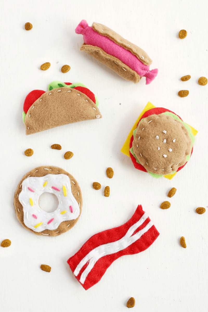 Check out these DIY Pet Gifts Your Furbaby Will Love! You will be surprised how easy these are to make and how much your pets will adore playing with them.