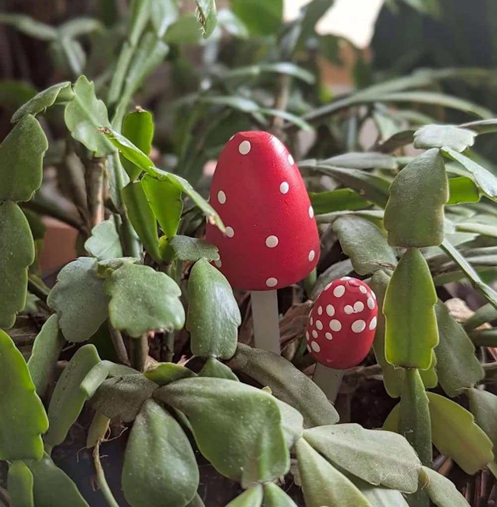 Vintage Shoe Stretchers Turned Into Mushroom Plant Pokes thrift store upcycle idea