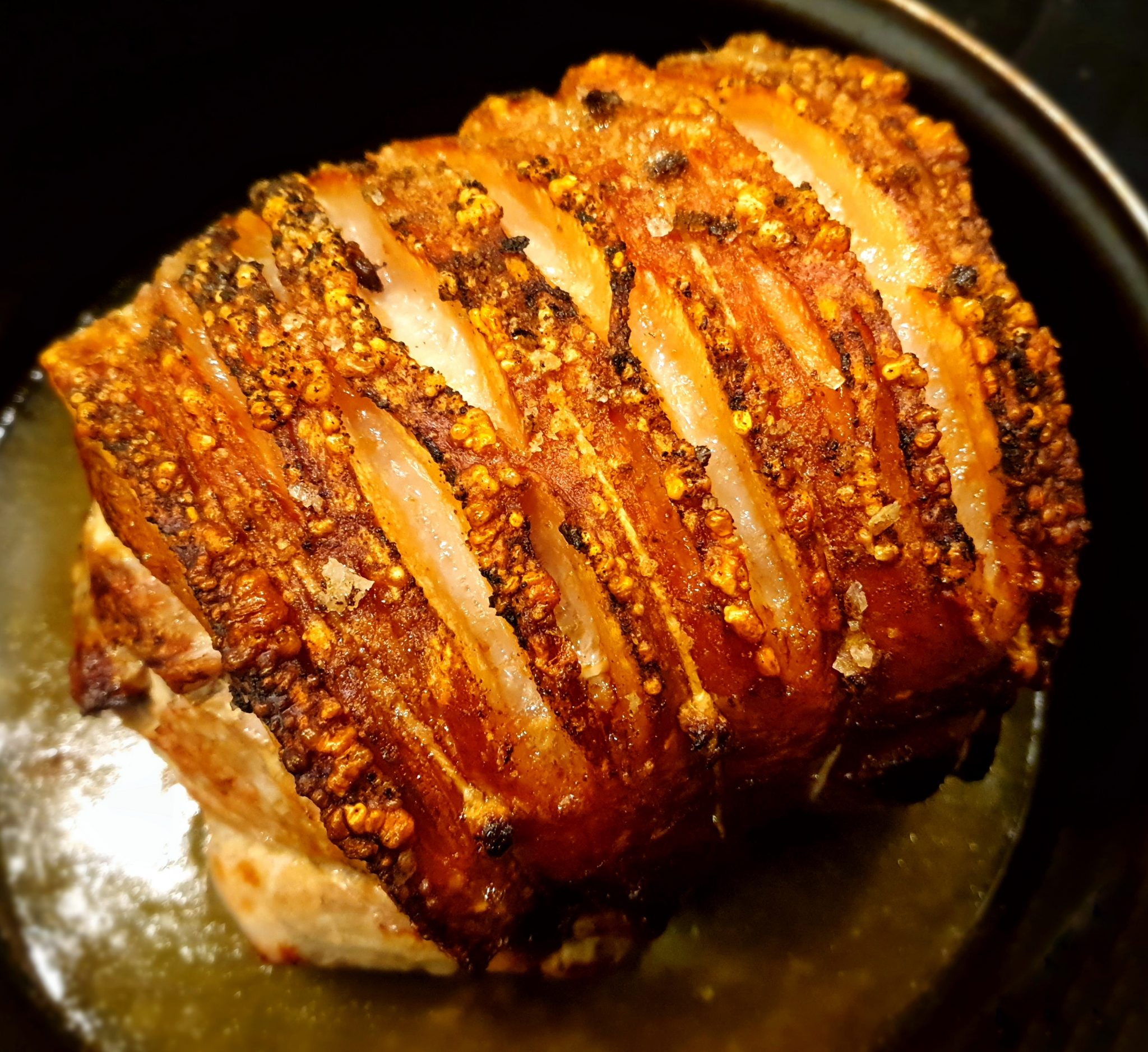Perfect roast pork with crispy crackling and beef dripping potatoes