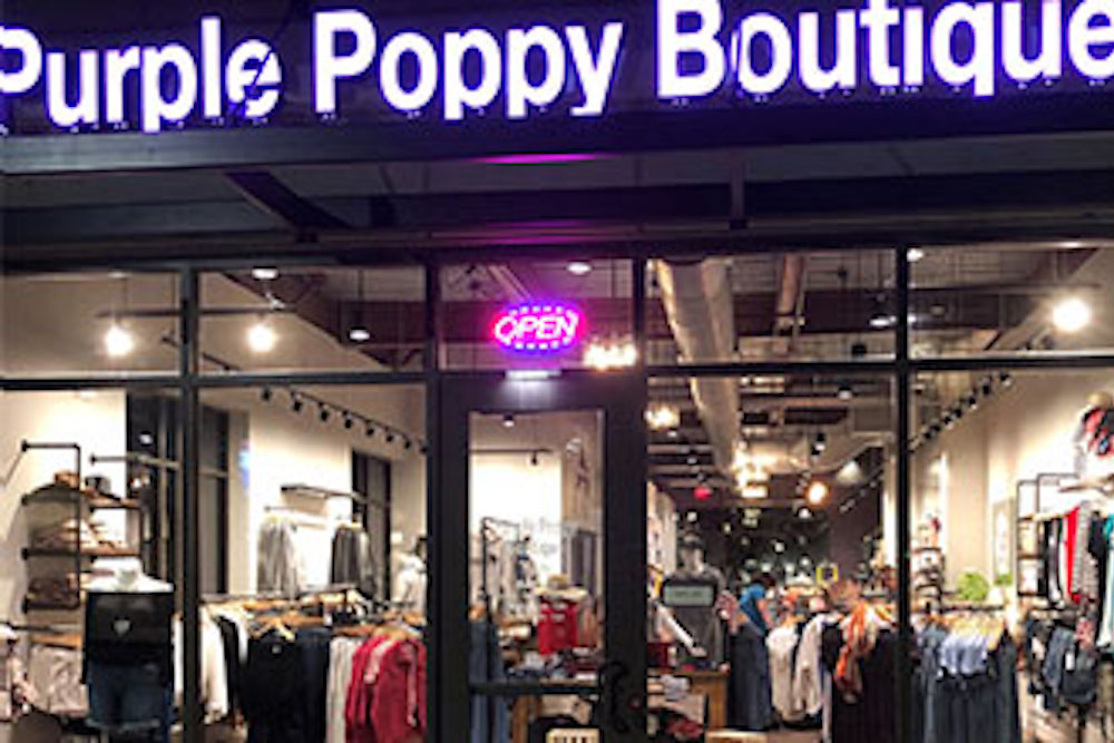 Purple Poppy Boutique The District at Prairie Trail