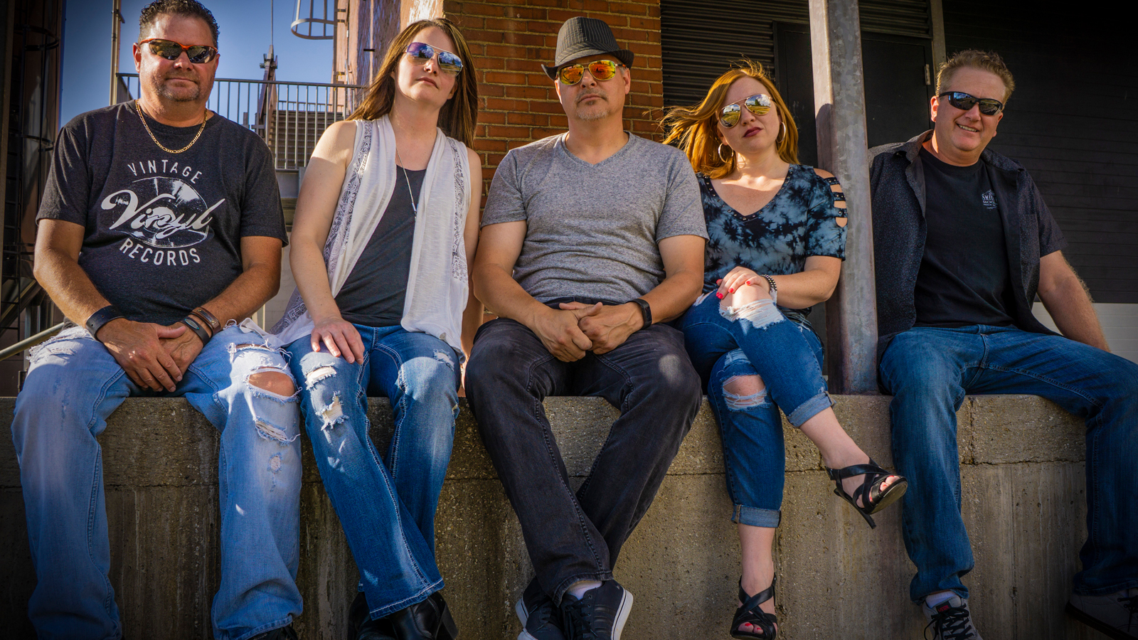 Sips and Songs The District at Prairie Trail