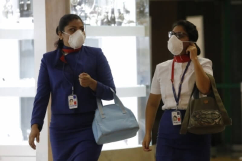 Wearing masks not mandatory anymore in flights in India The English