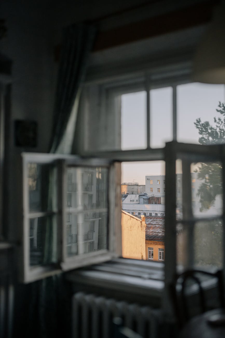 brown wooden framed glass window