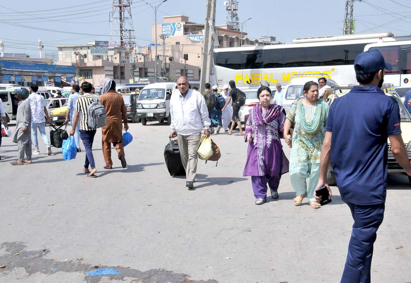 ISLAMABAD People arriving back to the city after spending Eid holidays
