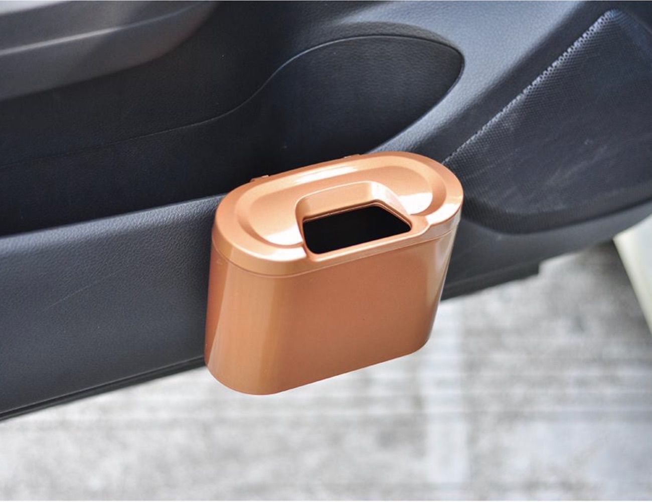 Keep your vehicle neat with this universal car garbage bin