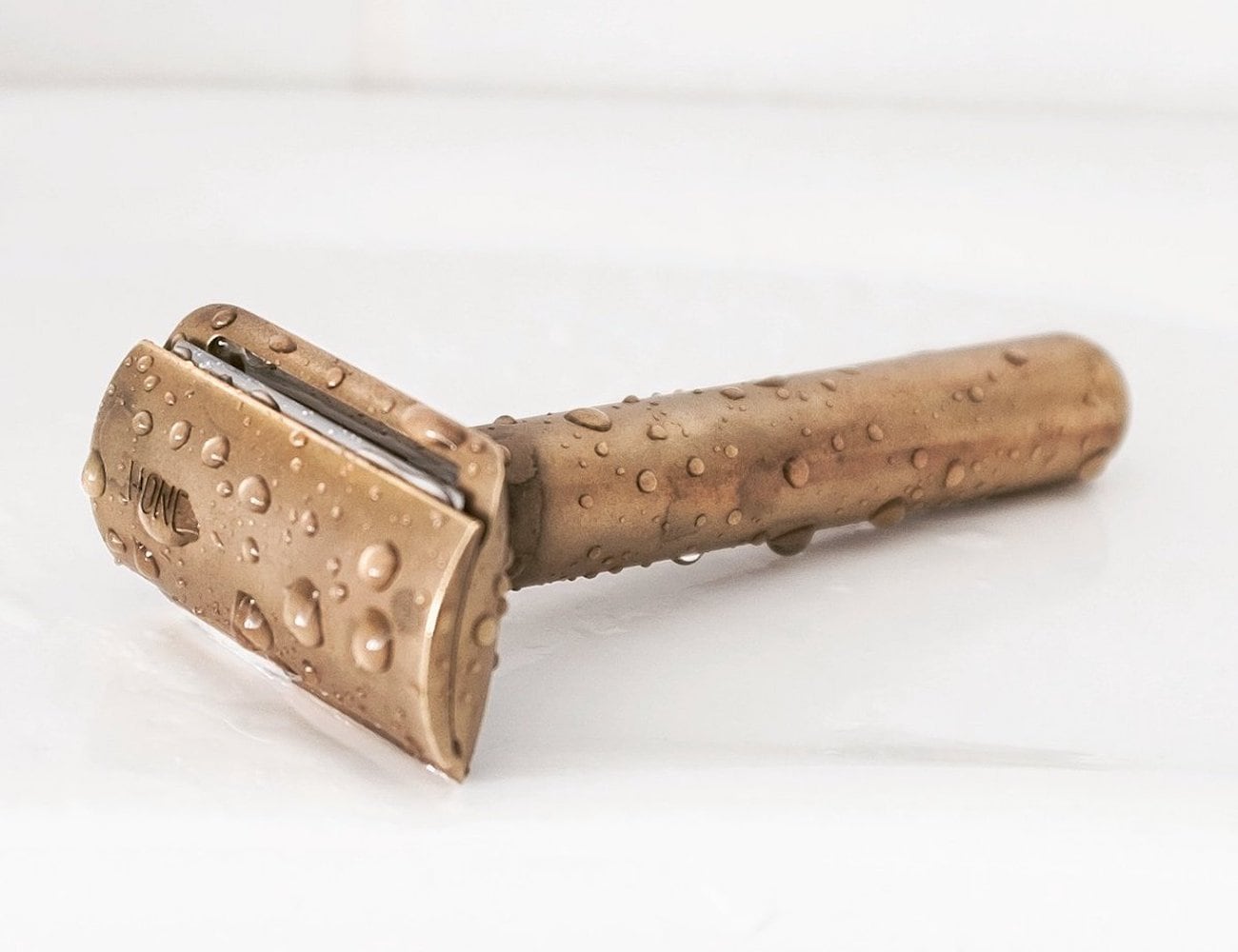 This golden safety razor will add pizazz to your bathroom counter