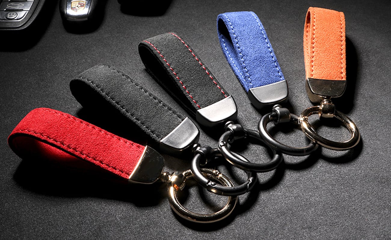 This Leather Strap Key Chain Features Alcantara Leather