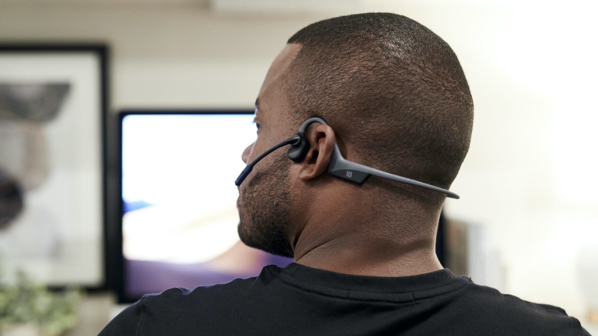 AfterShokz boneconduction headset features a noisecanceling