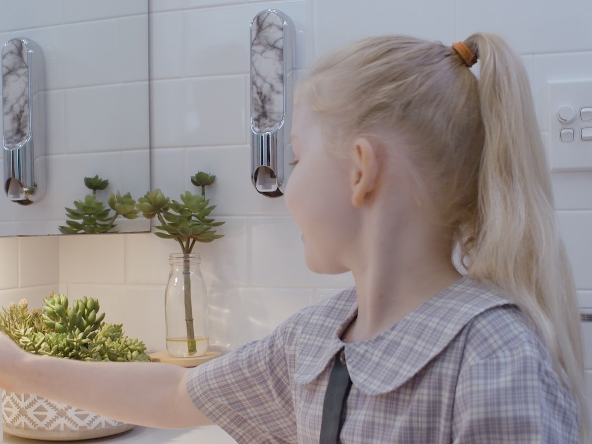 UpKit automatic toothpaste dispenser is a stylish bathroom accessory