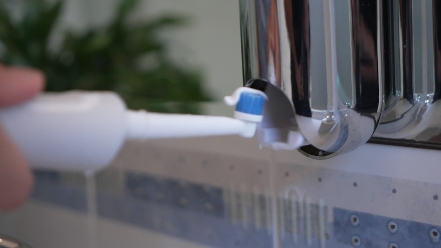 This stylish toothpaste dispenser makes it easier to keep your bathroom