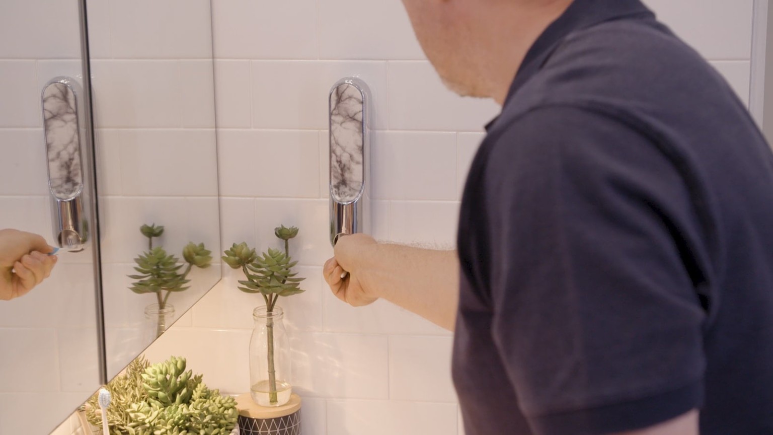 This stylish toothpaste dispenser makes it easier to keep your bathroom