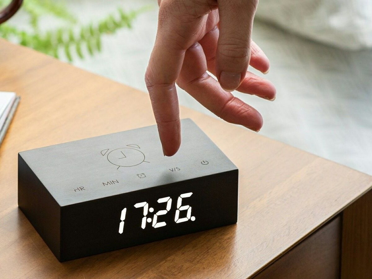 Gingko Flip Click Clock minimal alarm clock has engraved buttons and a