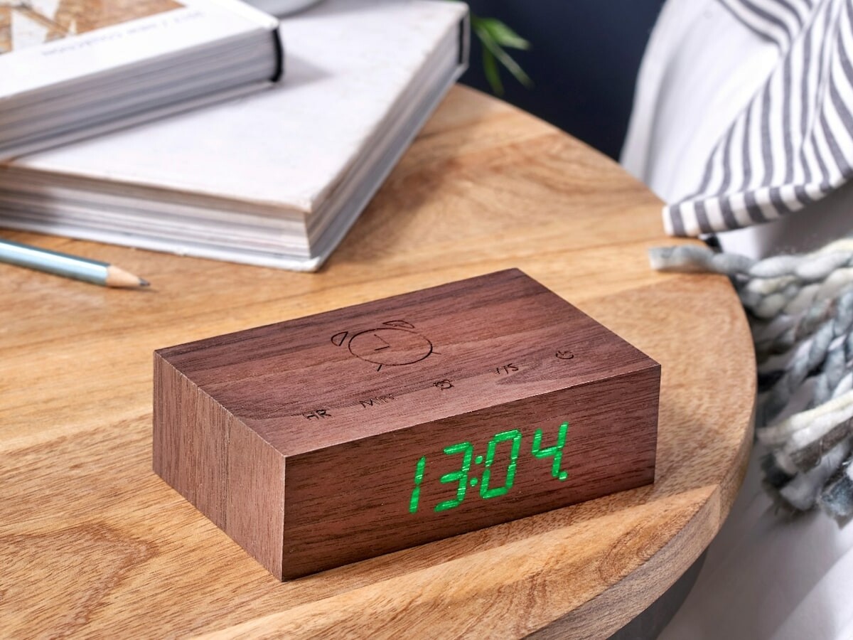 Gingko Flip Click Clock minimal alarm clock has engraved buttons and a