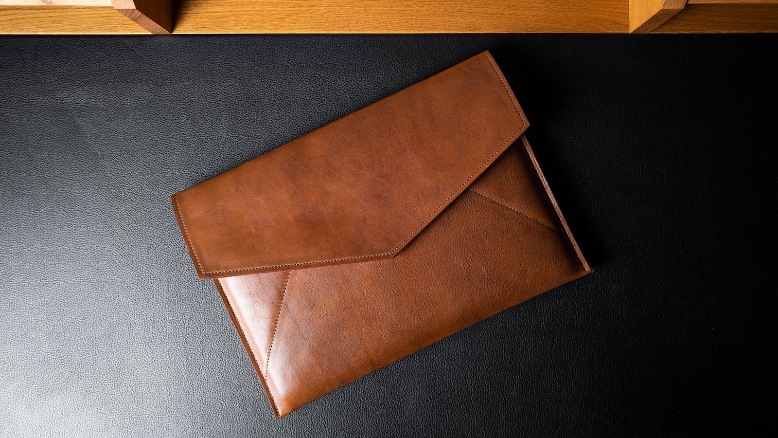 hardgraft Leather Envelope Large has a thick felted wool lining to