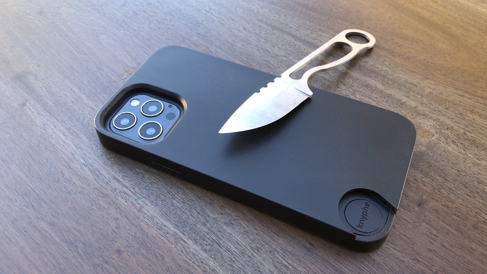 knyphe phone case + EDC knife securely stores a fixedblade knife in a