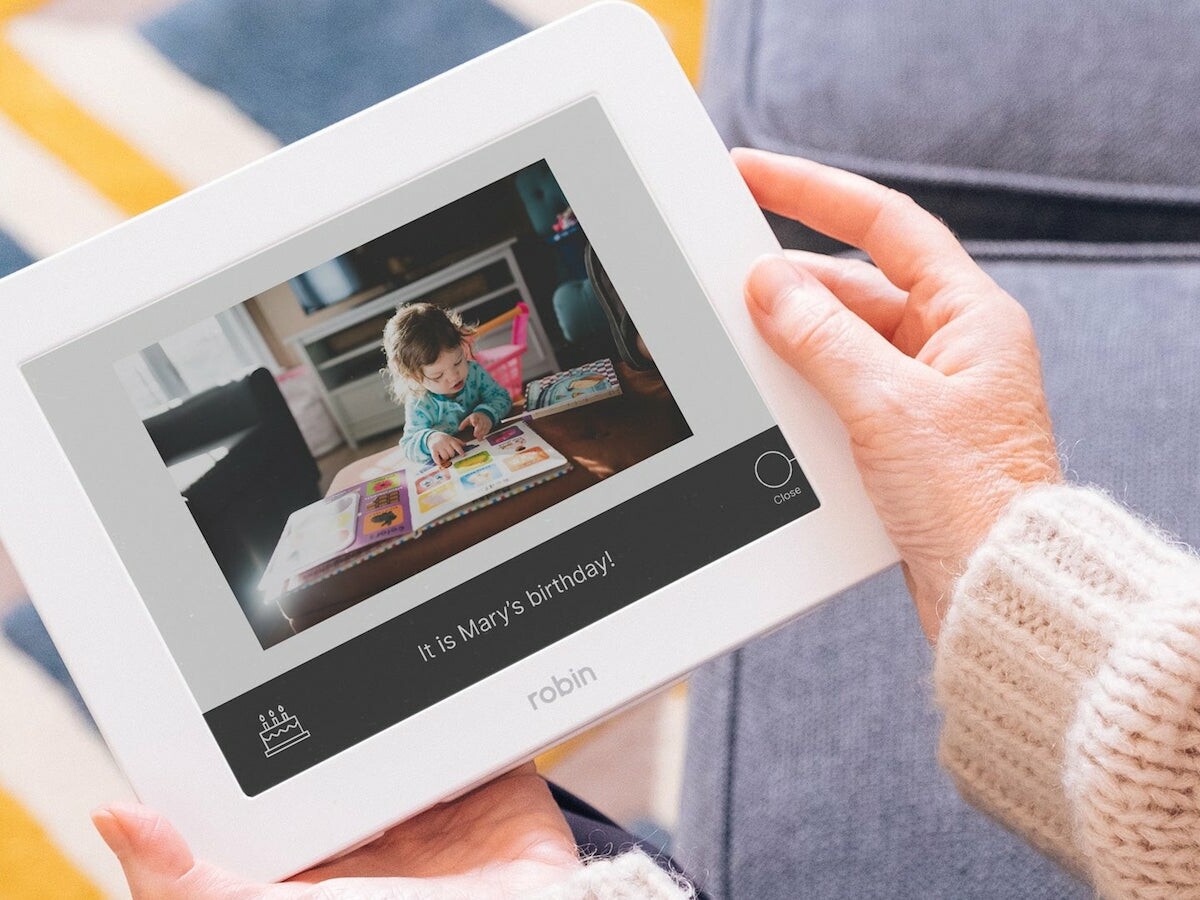 Robin Day Digital Clock reminds you of birthdays and has a 170