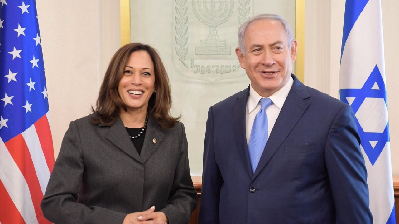 By clasping hands with Netanyahu, 'top cop' Kamala Harris whitewashes