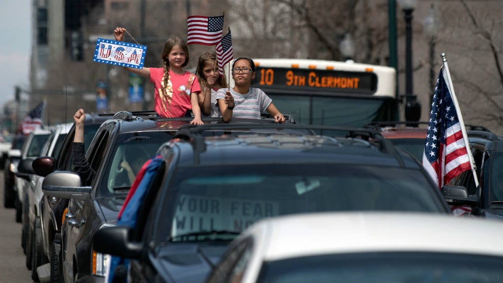 Health care workers block protesters challenging stayathome order in