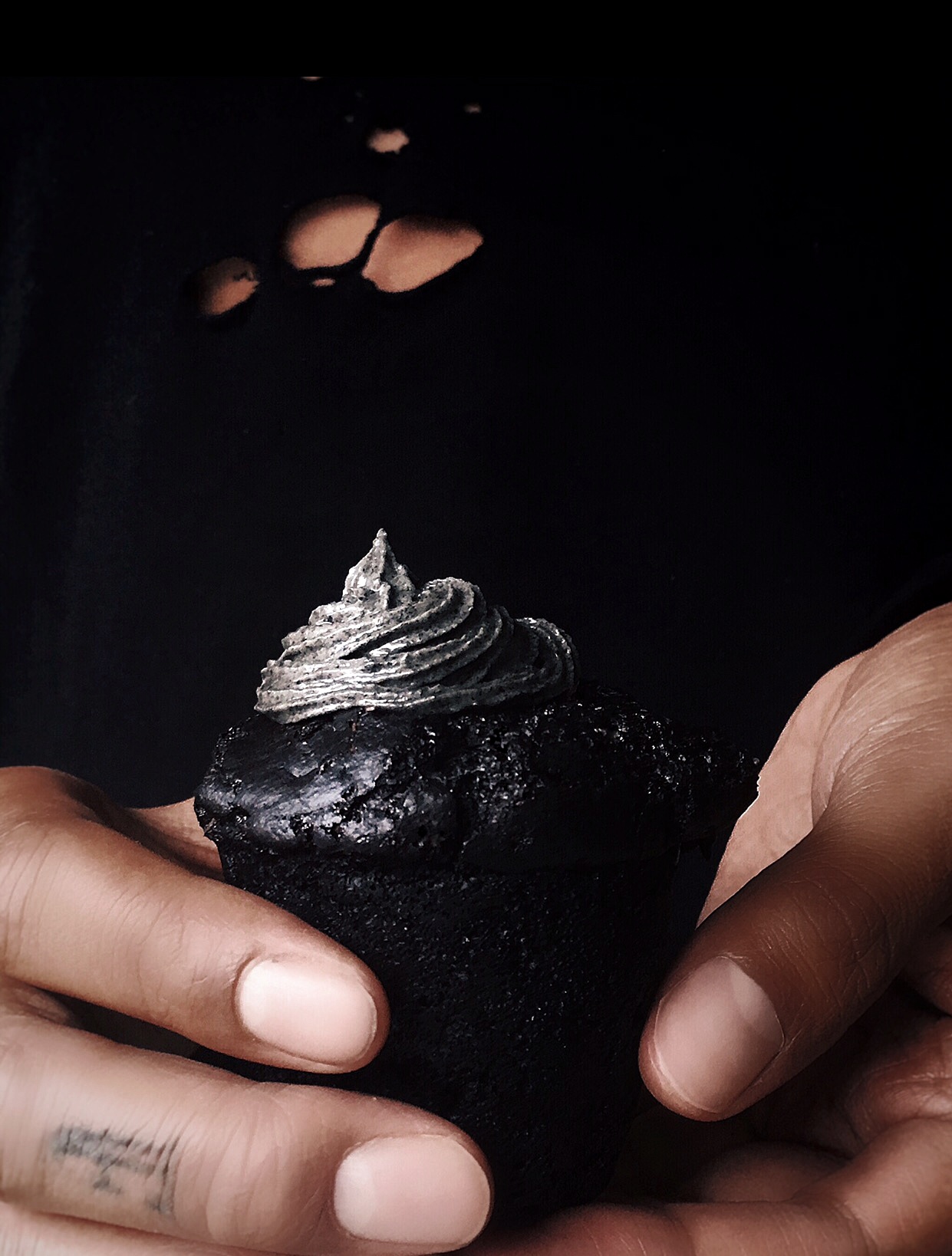 Black Cupcakes w/ Sliver Frosting Halloween Addition. the indigo