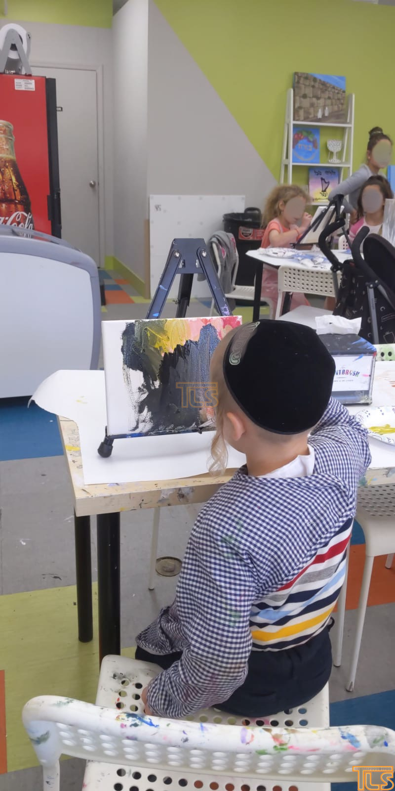 PHOTOS Paintbrush hosts free canvas painting for children without a