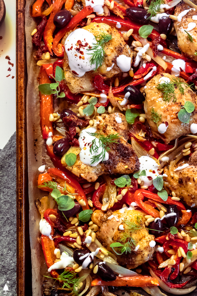 Simple, delicious, reliable, and easy to clean up, this Mediterranean chicken is everything you want from a weeknight dinner! #mediterraneanchicken #lowcarbmediterraneanchicken top view of mediterranean chicken recipe