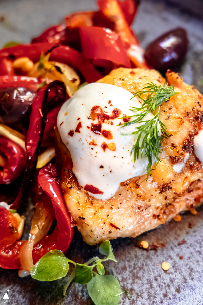 Simple, delicious, reliable, and easy to clean up, this Mediterranean chicken is everything you want from a weeknight dinner! #mediterraneanchicken #lowcarbmediterraneanchicken closer view of mediterranean chicken recipe