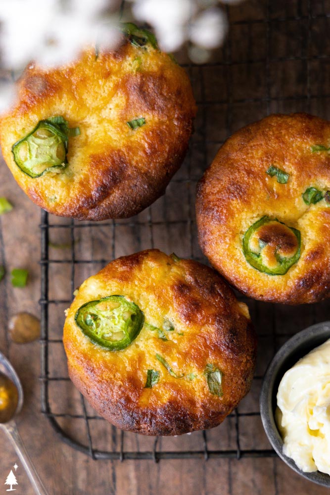 Lightly sweet, fluffy, and full of corn flavor, these keto cornbread muffins are everything the soul craves! Just without the carbs. #ketocornbreadmuffins #lowcarbcornbreadmuffins top view of keto jalapeno cornbread muffins