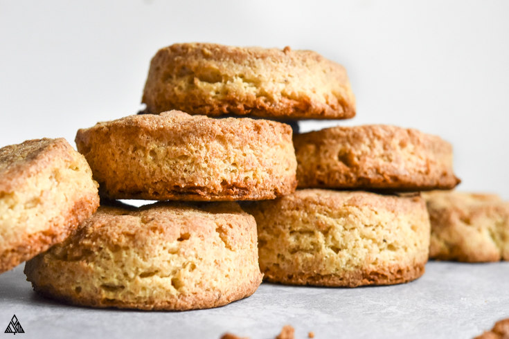 This homemade, buttery keto biscuits recipe is one to write home about. In fact, invite the whole family over to try them. #lowcarbbiscuits #ketobiscuits stack of low carb biscuits
