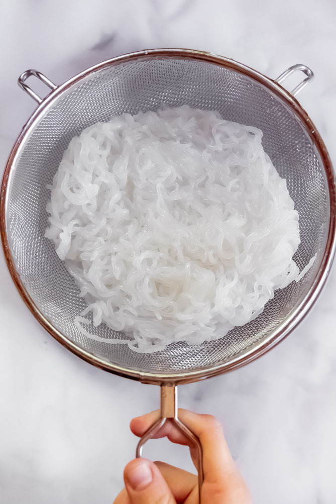 *NEW* I want this keto ramen to comfort you. Flavorful. Noodles. Jammy. Egg. This is not your every day low carb chicken soup. #ketoramen #lowcarbramen top view of keto ramen noodles ingredients