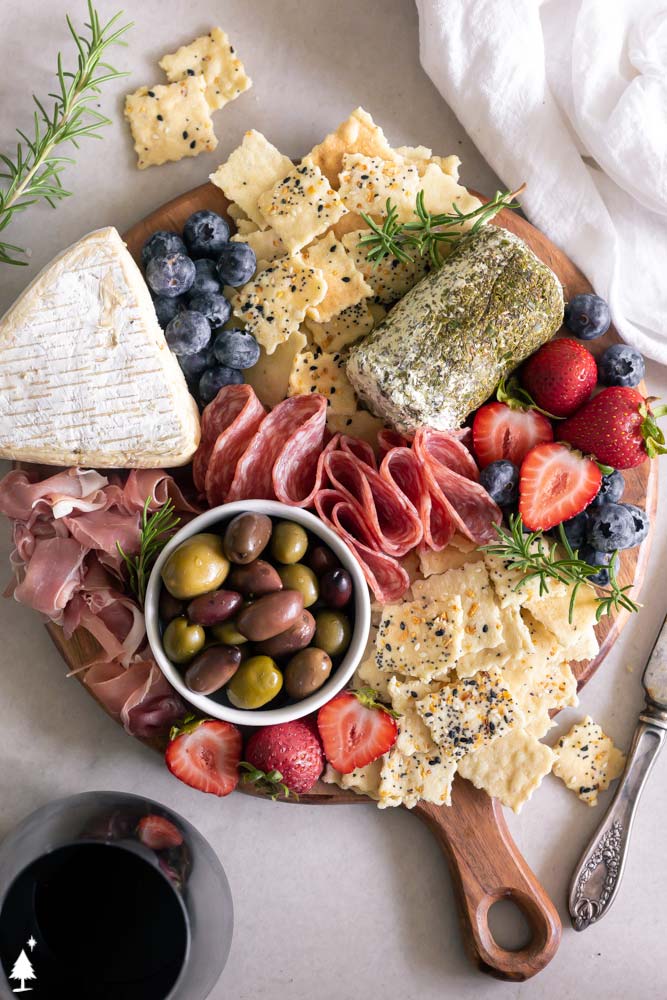 Pour yourself a glass of wine, grab a block of cheese, and bake yourself these keto crackers. They're salty, crispy, and crunchy. #lowcarbcrackers #ketocrackers closer view of keto friendly crackers