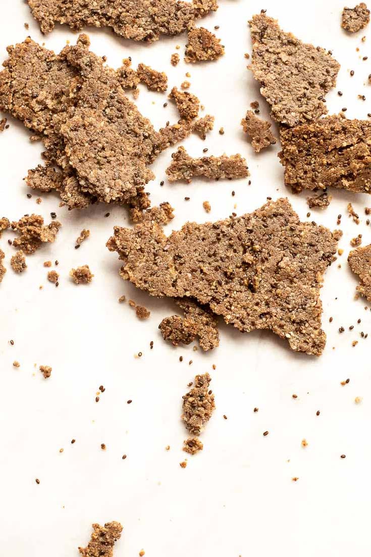 *NEW* Naughty meets nutritious, with these flaxseed crackers that have an oh-so-crave-able snap, crackle, and crunch, yet are full of nutrients. #flaxseedcrackers #lowcarbflaxseedcrackers closer view of keto flaxseed crackers
