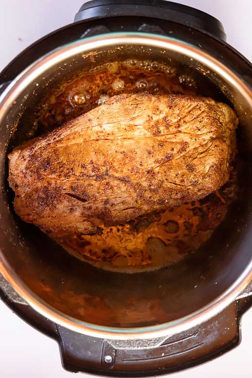 sear the pork roast in the instant pot
