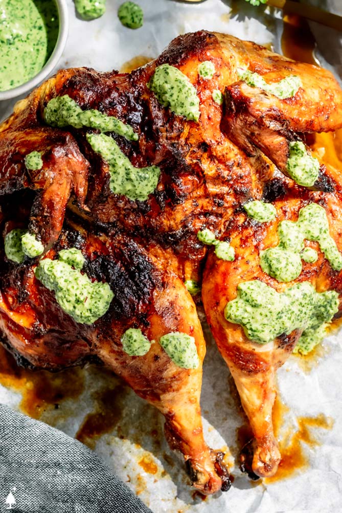 peruvian recipes with green sauce on a baking sheet