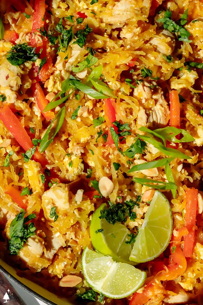 spaghetti squash pad thai close up, with fresh ingredients on top