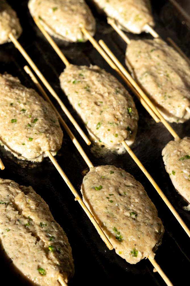 chicken kofta kebab on a griddle