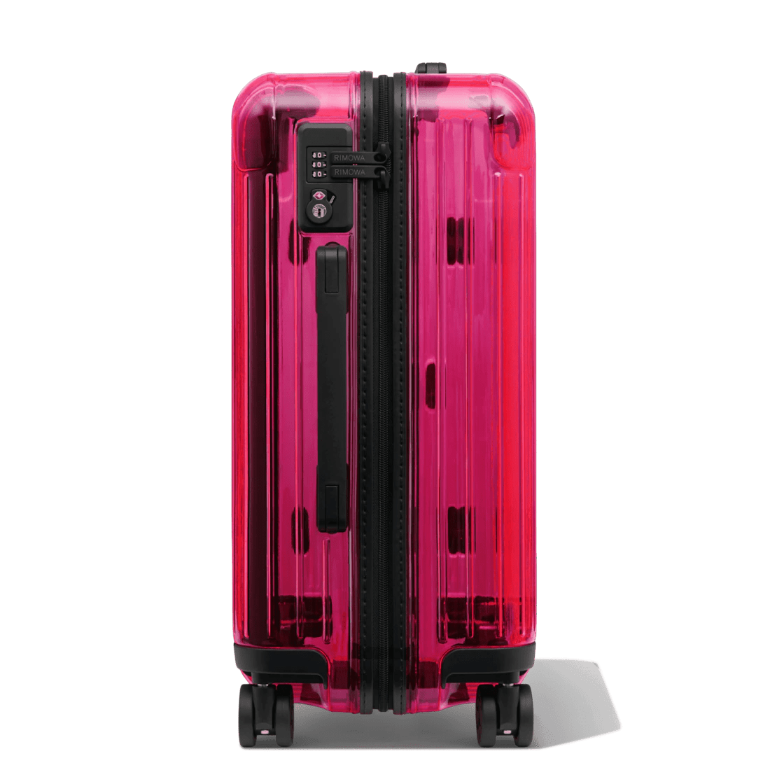 RIMOWA's Essential Suitcases Take on a Vivid Neon Look The Luxury Editor