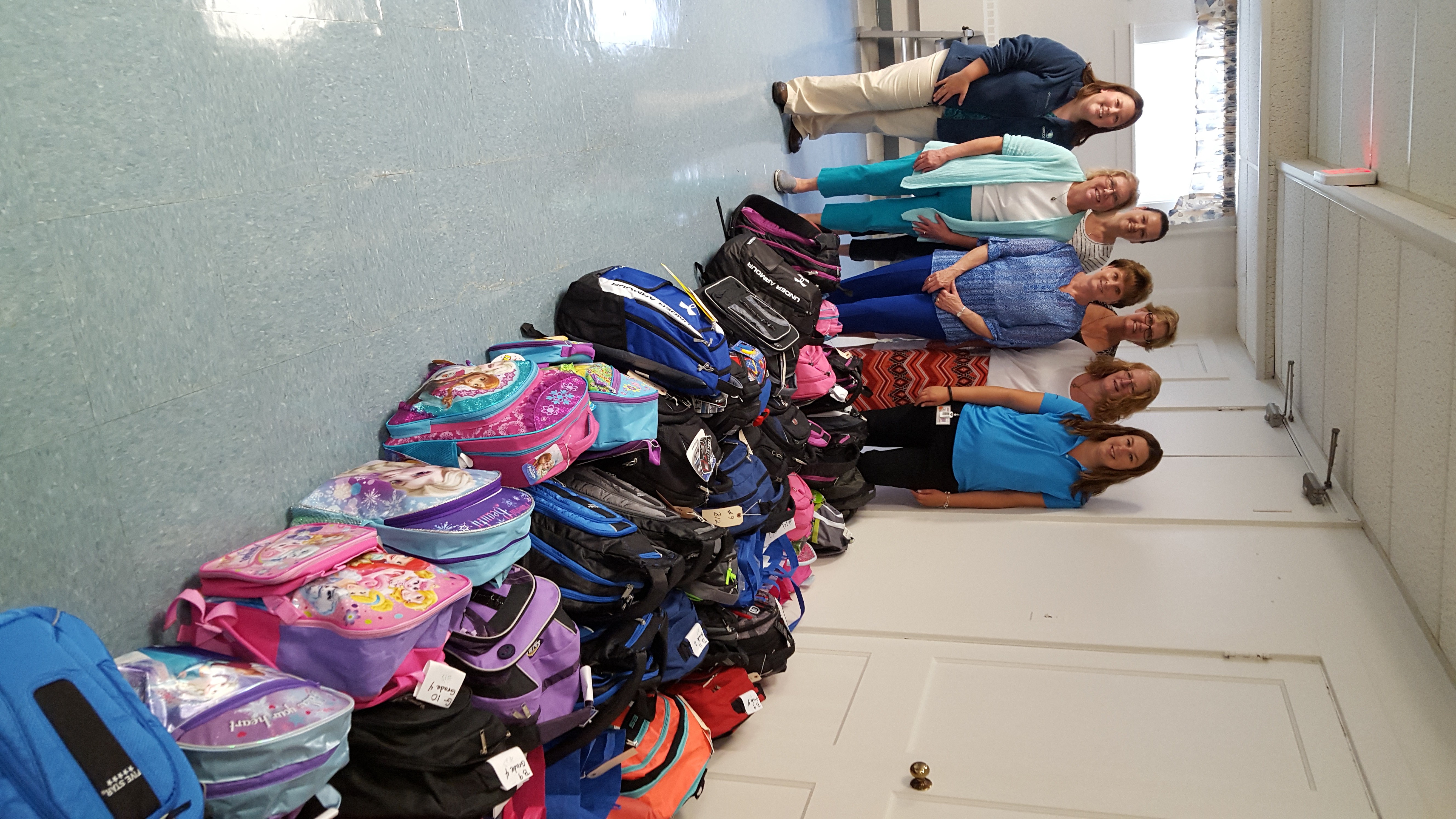 Amcor & Staples Donate Backpacks & School Supplies to Manchester