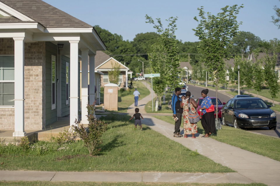 Habitat for Humanity rewards nine families with keys to new homes