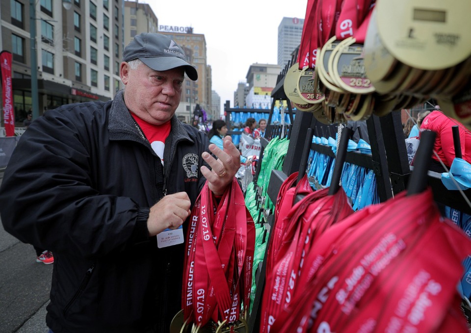 Hero's Thousands of runners pack streets for St. Jude Marathon