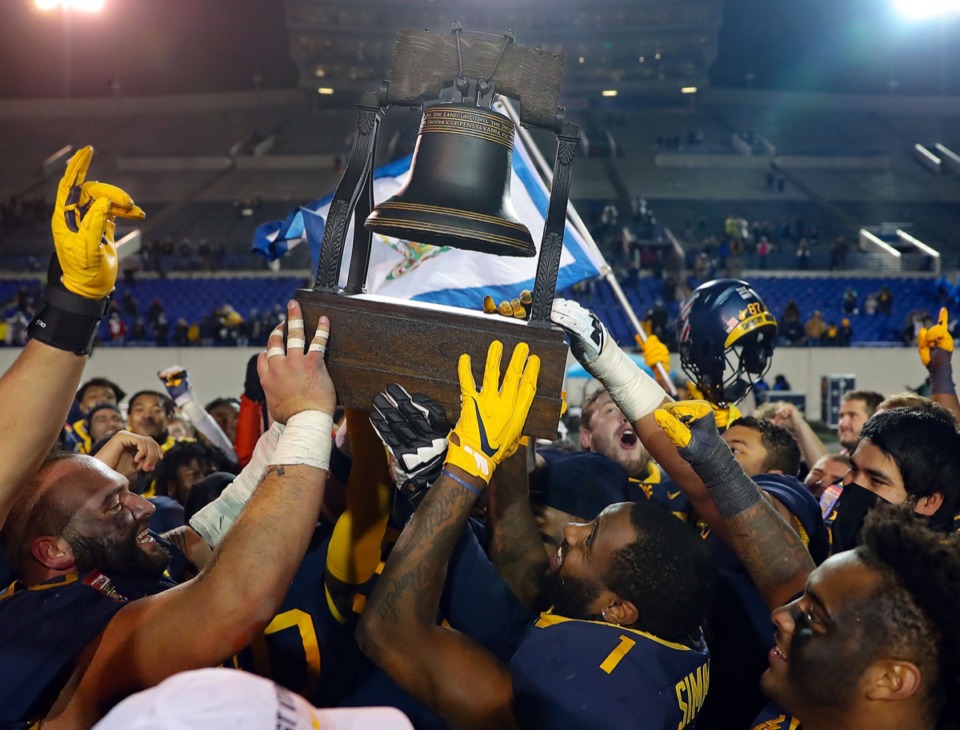 Austin Kendall leads West Virginia to a 2421 win over Army Memphis