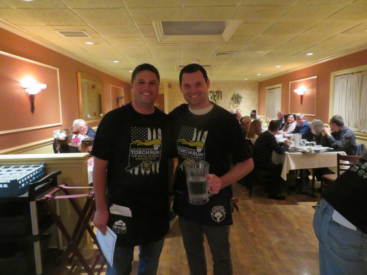 Monroe’s Finest serve Roberto’s Restaurant patrons for Special Olympics