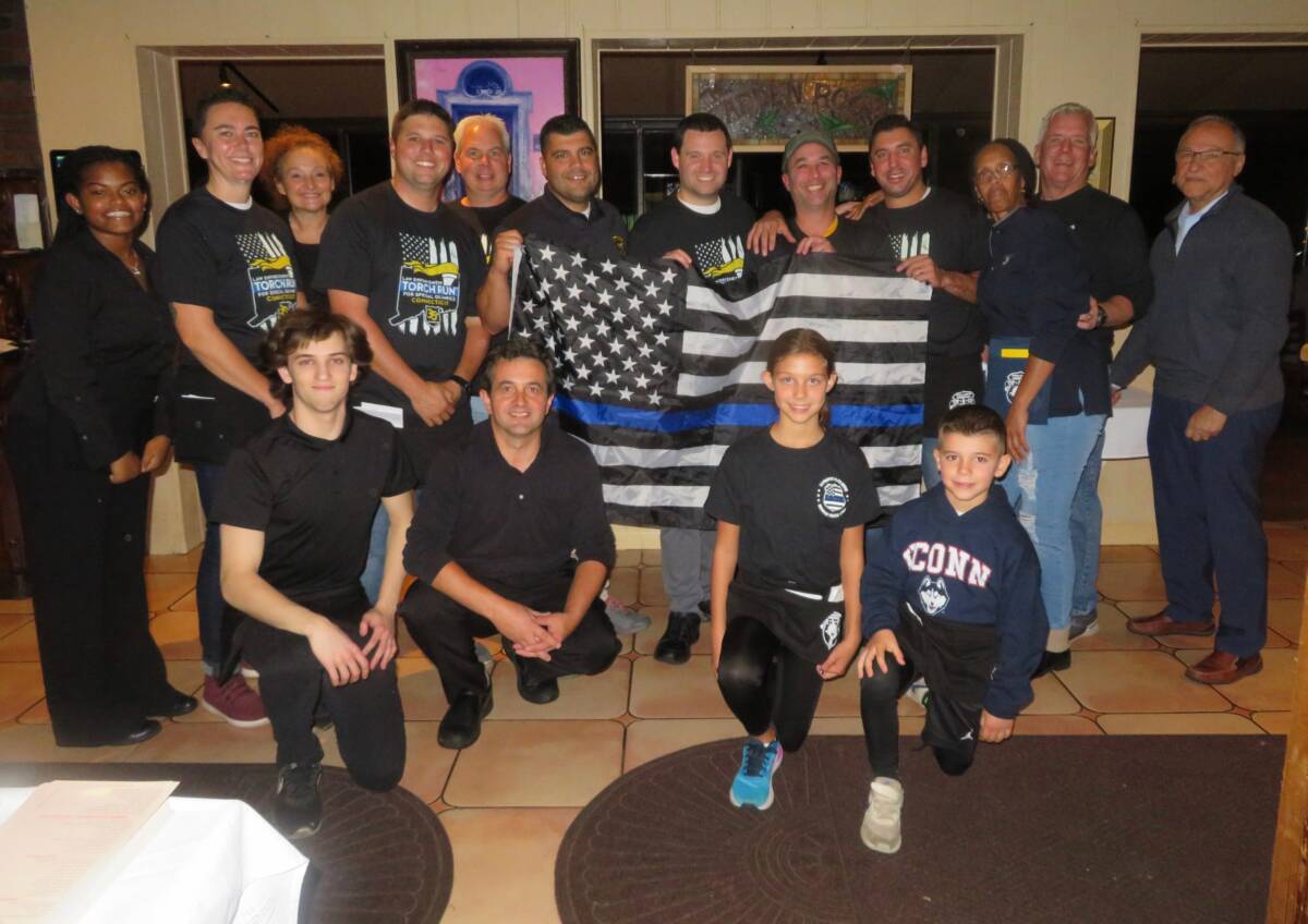 Monroe’s Finest serve Roberto’s Restaurant patrons for Special Olympics