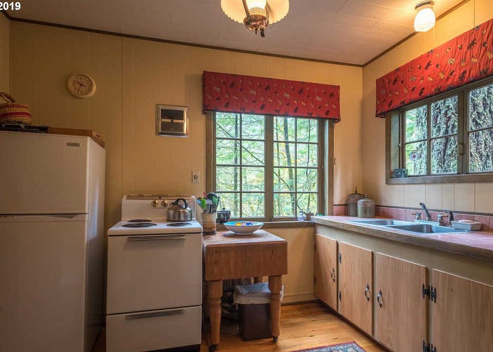 Oregon mountain cabin along the Zigzag River. Circa 1938. 299,800