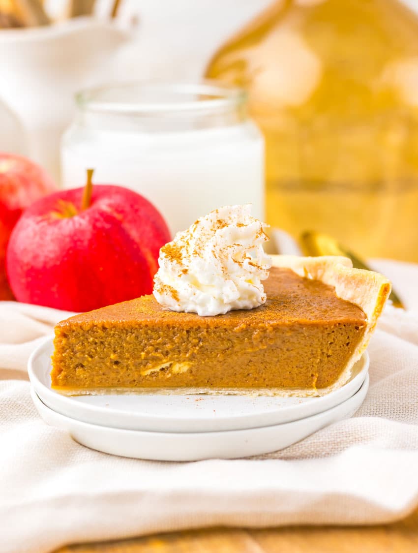 a slice of apple butter pie on a small white dessert plate