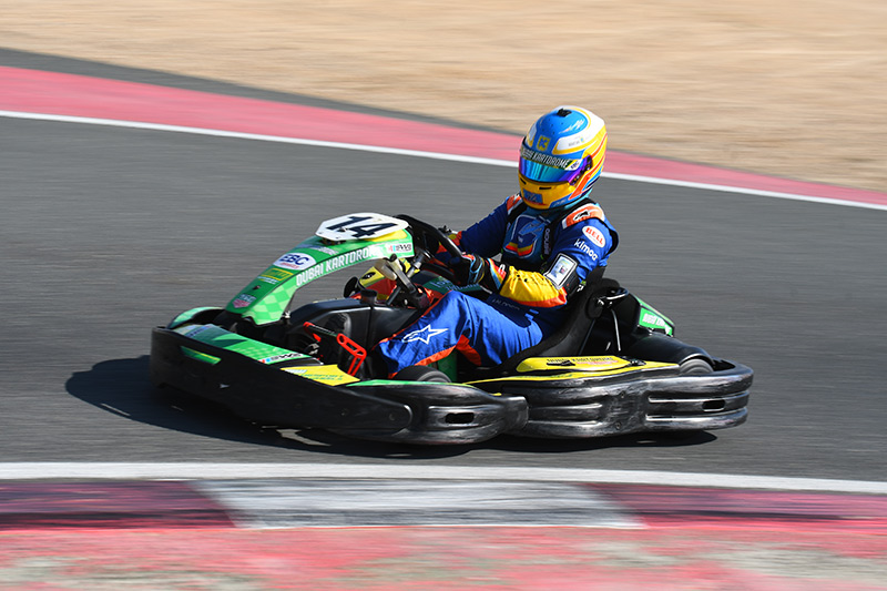 Fernando Alonso on the podium of Dubai Karting 24 Hours The RaceBox