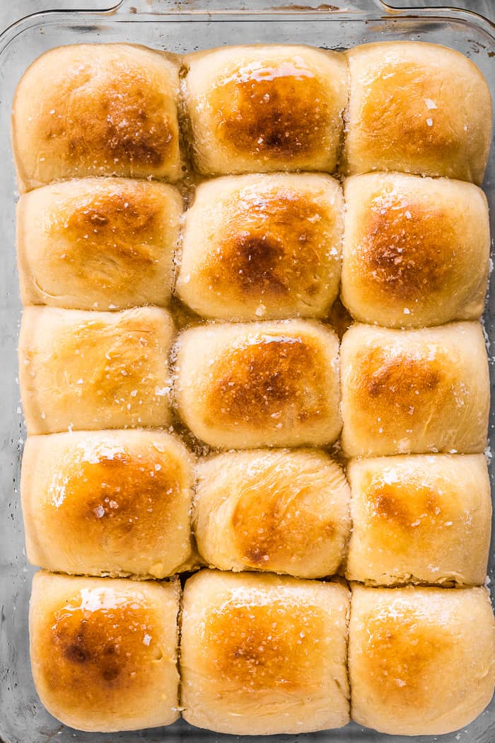 These potato rolls are light, fluffy, and absolutely delicious. They make the perfect dinner buns and are great for sandwiches and dipping into soup, too. A tray of pull apart potato rolls.